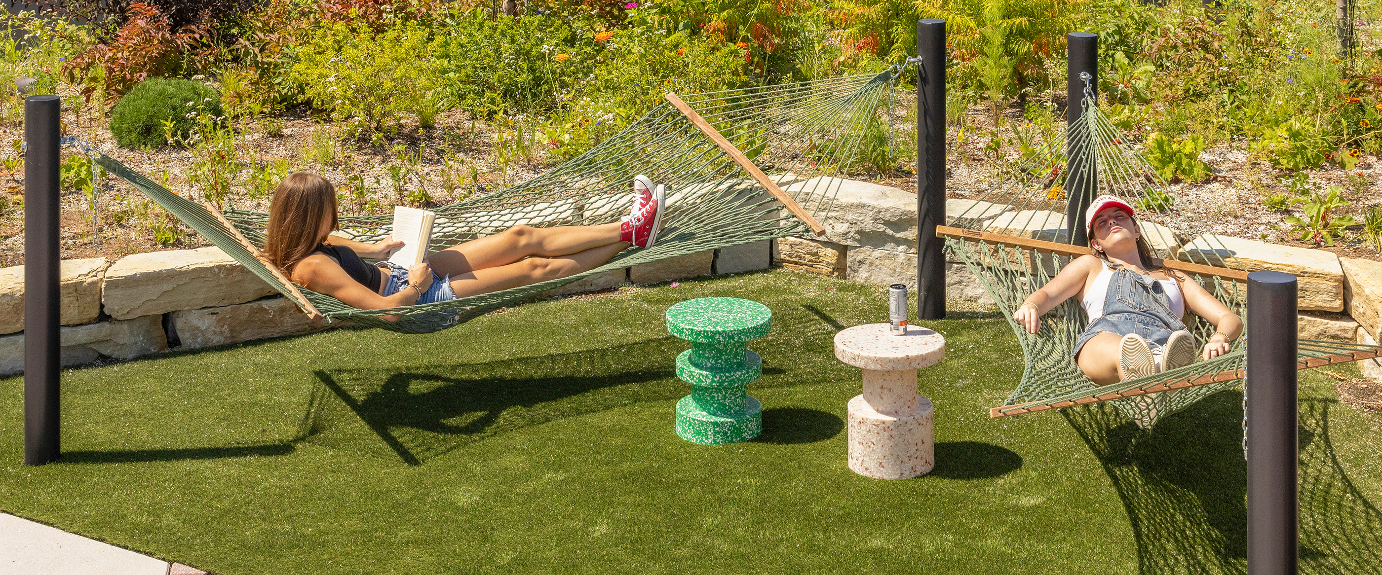 Friends relaxing on hammocks