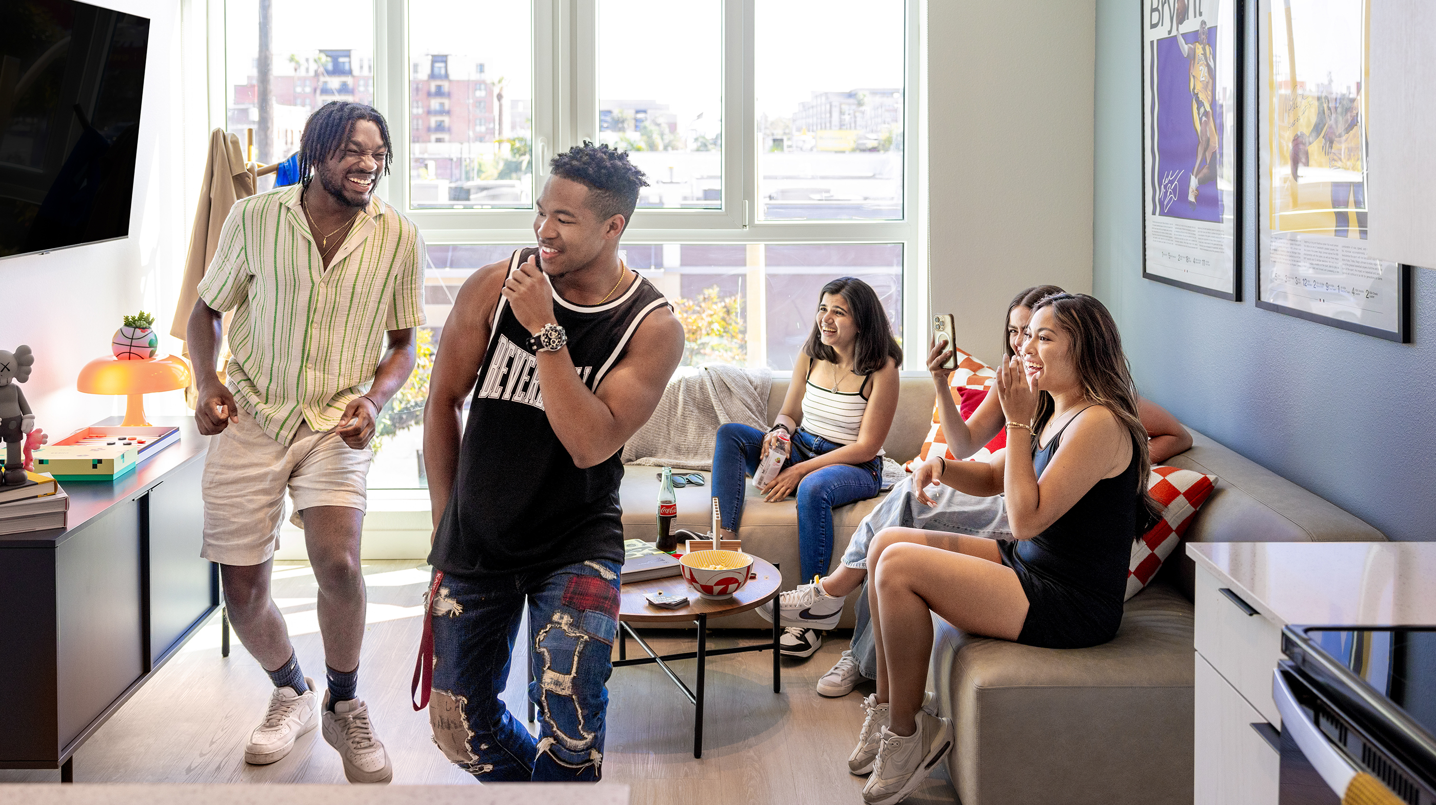 Friends laughing in a living room